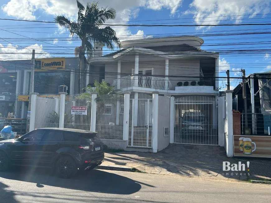 Foto 1 de Sobrado com 4 Quartos à venda, 257m² em Marechal Rondon, Canoas