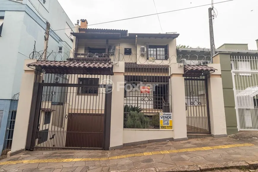 Foto 1 de Casa com 4 Quartos à venda, 256m² em Santo Antônio, Porto Alegre