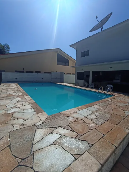 Foto 1 de Casa de Condomínio com 4 Quartos para alugar, 170m² em Riviera de São Lourenço, Bertioga