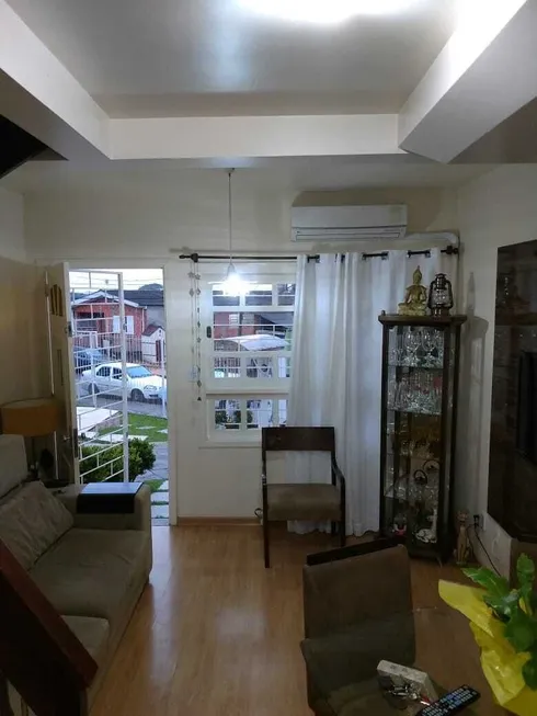 Foto 1 de Casa de Condomínio com 2 Quartos à venda, 57m² em Passo das Pedras, Porto Alegre