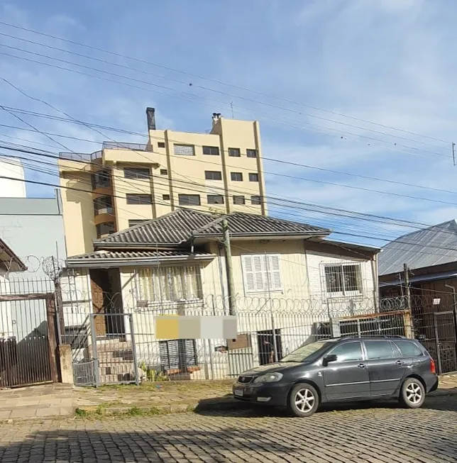 Foto 1 de Casa à venda, 100m² em Centro, Caxias do Sul