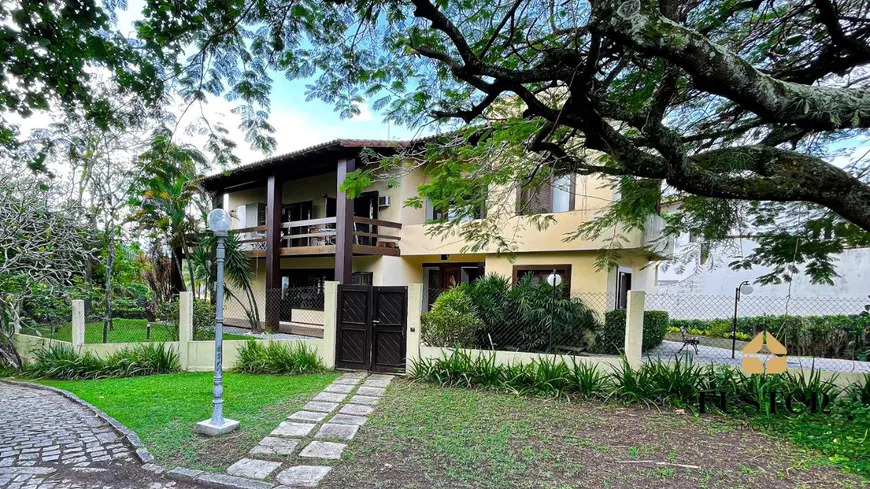 Foto 1 de Casa de Condomínio com 4 Quartos à venda, 940m² em Barra da Tijuca, Rio de Janeiro