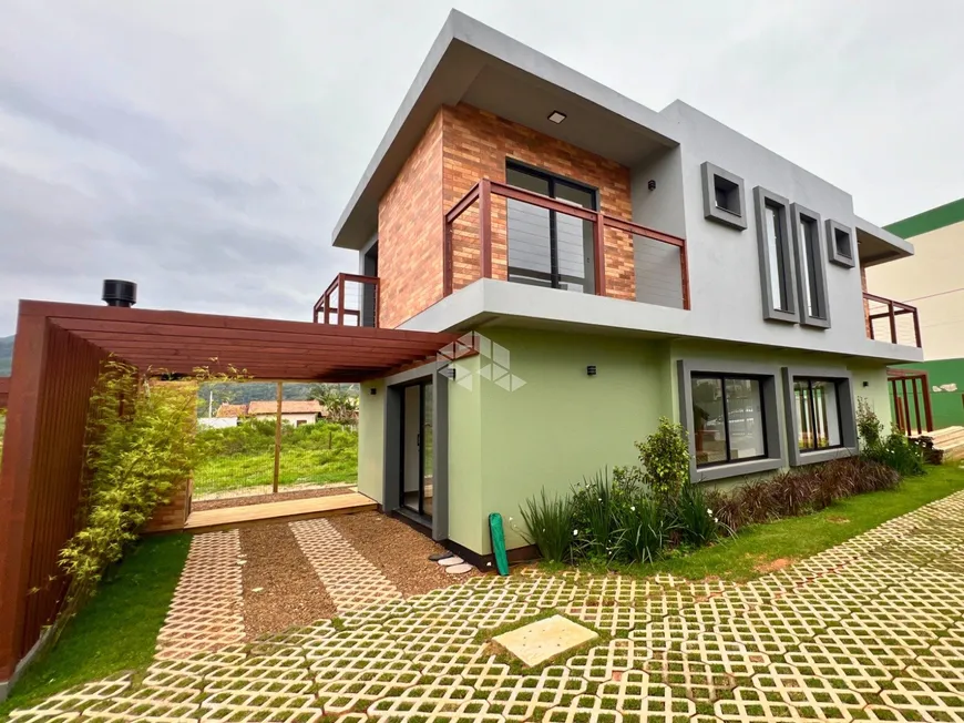 Foto 1 de Casa com 3 Quartos à venda, 106m² em Ambrósio, Garopaba