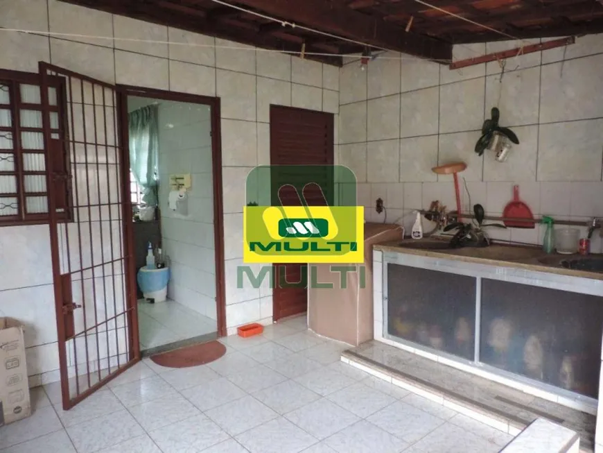 Foto 1 de Casa com 4 Quartos à venda, 302m² em Daniel Fonseca, Uberlândia