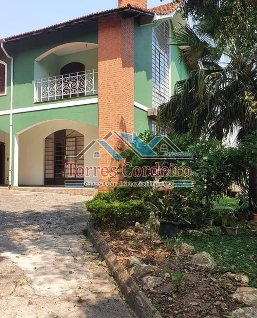 Foto 1 de Casa de Condomínio com 3 Quartos à venda, 300m² em Parque Assunção, Taboão da Serra