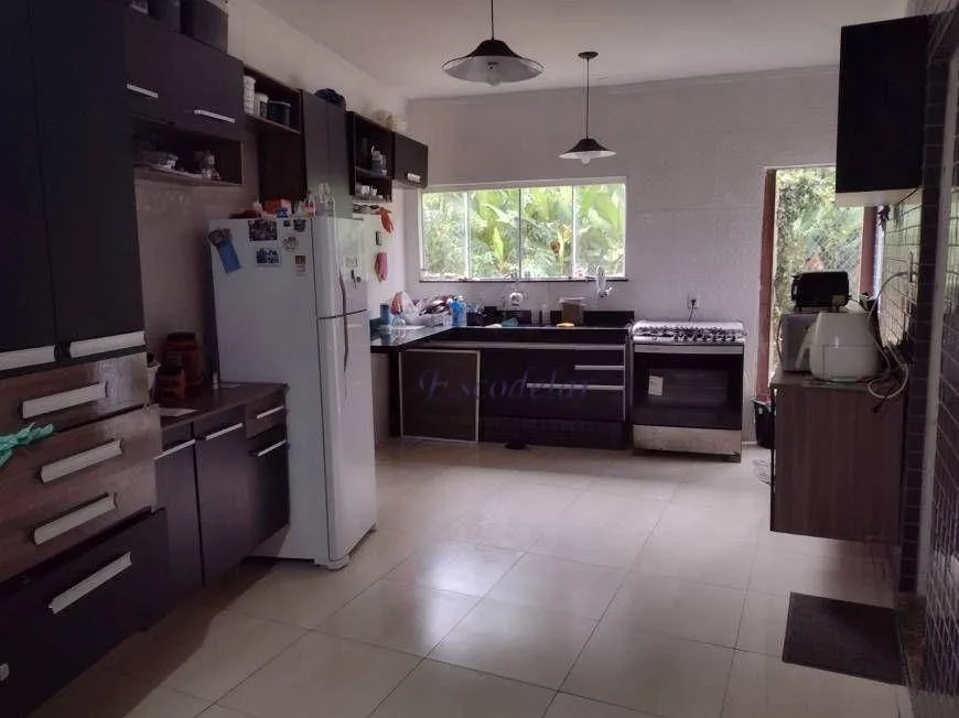 Foto 1 de Casa de Condomínio com 3 Quartos à venda, 291m² em Serra da Cantareira, Mairiporã
