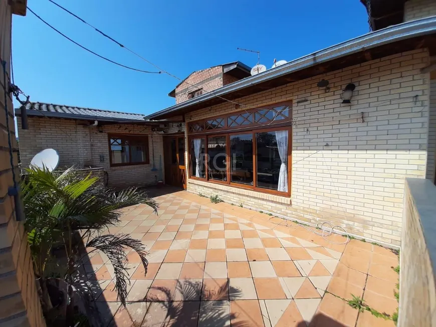 Foto 1 de Casa com 3 Quartos à venda, 275m² em Guarujá, Porto Alegre