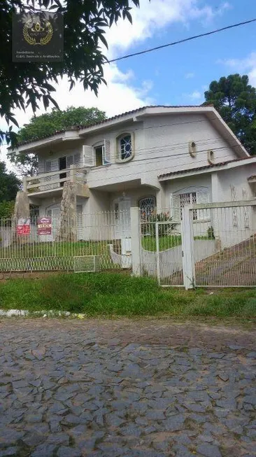 Foto 1 de Sobrado com 6 Quartos à venda, 280m² em Tarumã, Viamão