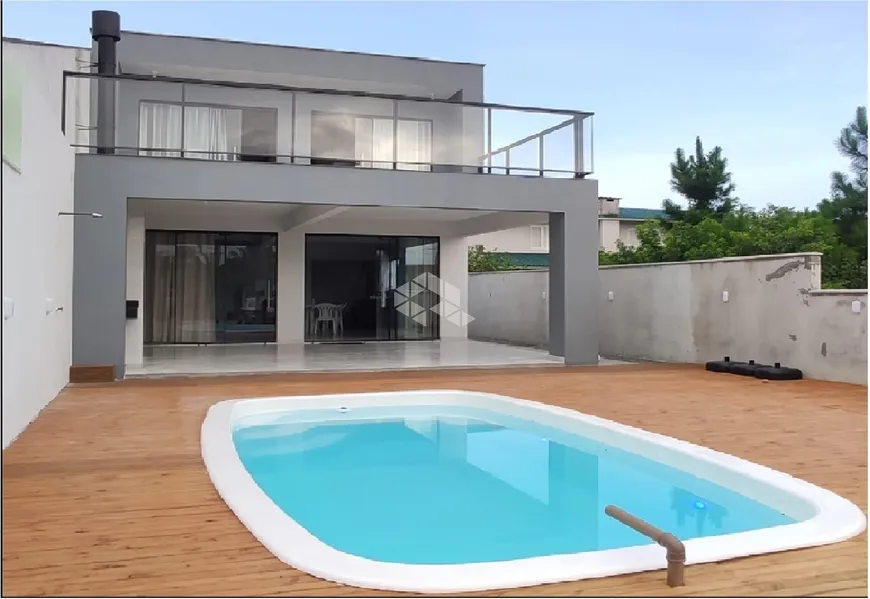 Foto 1 de Casa com 3 Quartos à venda, 152m² em Praia do Meio - Ens Brito, Palhoça