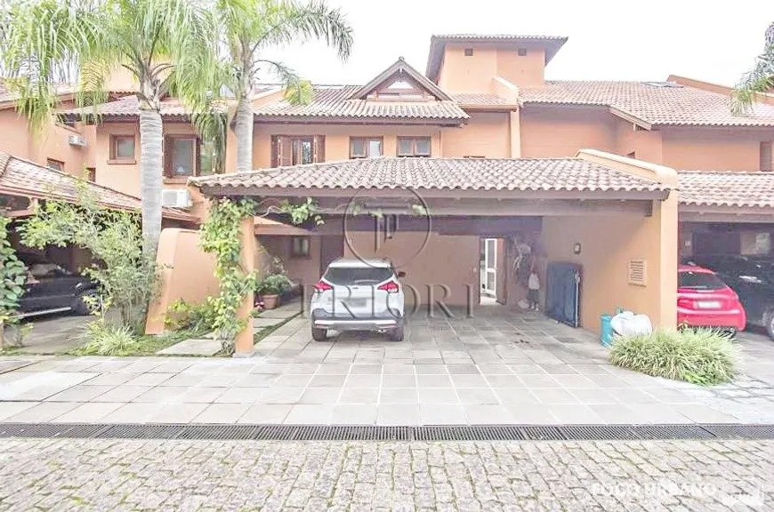 Foto 1 de Casa de Condomínio com 4 Quartos para venda ou aluguel, 520m² em Três Figueiras, Porto Alegre