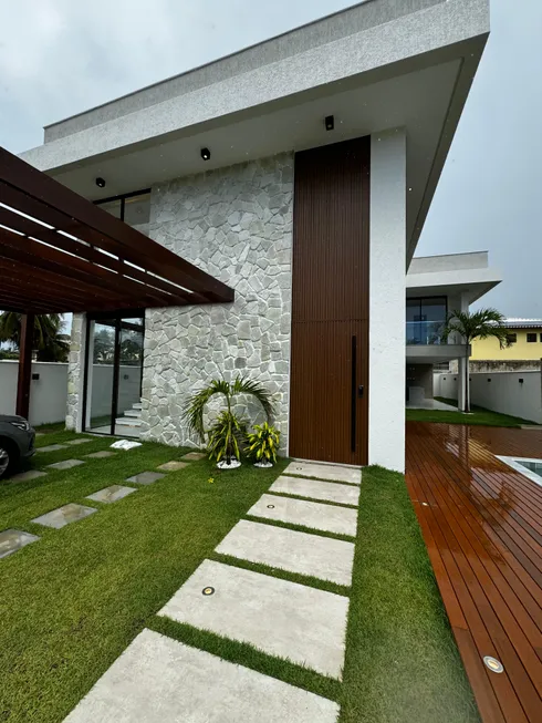 Foto 1 de Casa de Condomínio com 7 Quartos à venda, 320m² em Guarajuba, Camaçari