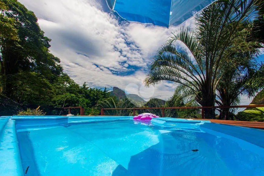 Foto 1 de Casa de Condomínio com 7 Quartos à venda, 317m² em Itanhangá, Rio de Janeiro