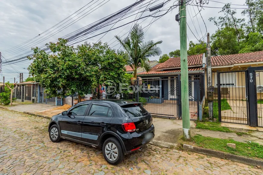 Foto 1 de Casa com 4 Quartos à venda, 97m² em Hípica, Porto Alegre
