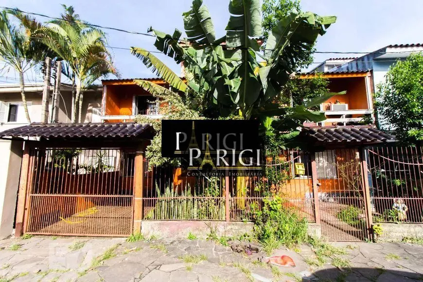 Foto 1 de Casa com 4 Quartos à venda, 226m² em Cavalhada, Porto Alegre