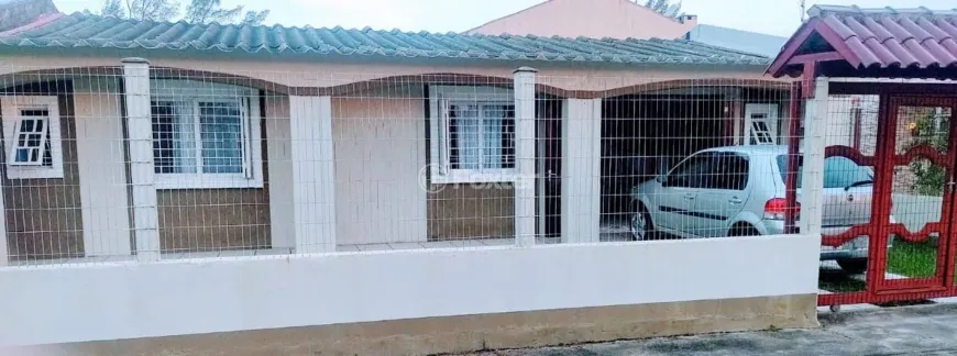 Foto 1 de Casa com 3 Quartos à venda, 101m² em Atlantida Sul, Osório