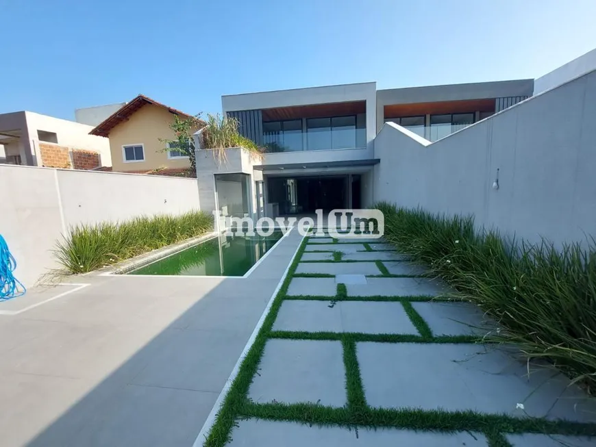 Foto 1 de Casa de Condomínio com 4 Quartos à venda, 350m² em Barra da Tijuca, Rio de Janeiro