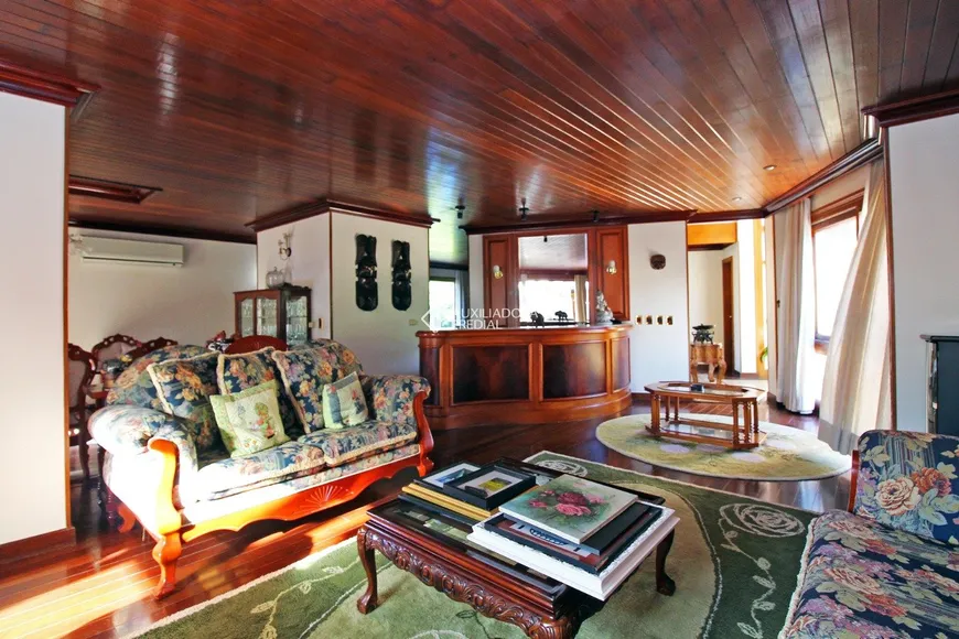 Foto 1 de Casa com 6 Quartos à venda, 889m² em Cavalhada, Porto Alegre