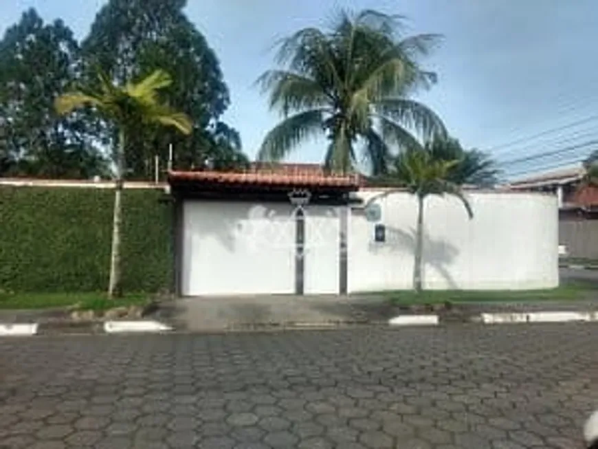 Foto 1 de Casa com 4 Quartos à venda, 370m² em Martim de Sa, Caraguatatuba