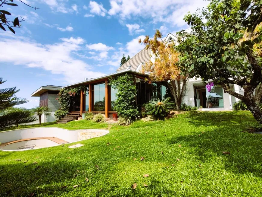 Foto 1 de Casa de Condomínio com 4 Quartos à venda, 640m² em Cacupé, Florianópolis