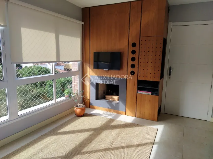 Foto 1 de Apartamento com 2 Quartos à venda, 68m² em Auxiliadora, Porto Alegre