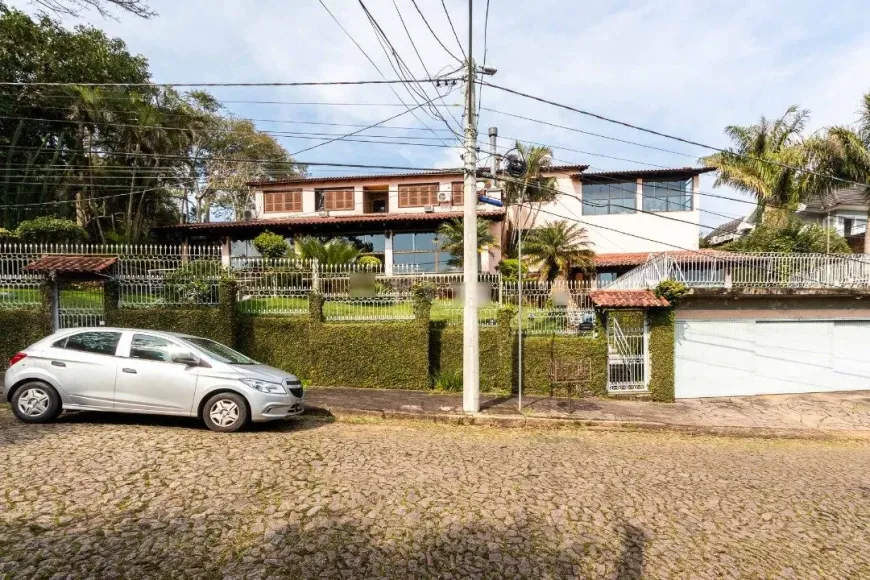 Foto 1 de Casa com 4 Quartos à venda, 499m² em Vila Conceição, Porto Alegre