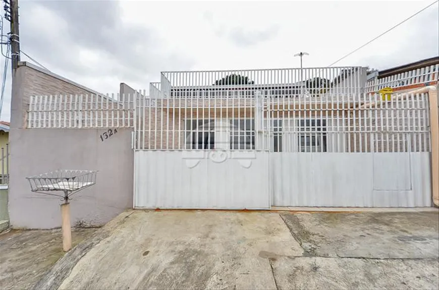 Foto 1 de Sobrado com 3 Quartos à venda, 198m² em Uberaba, Curitiba