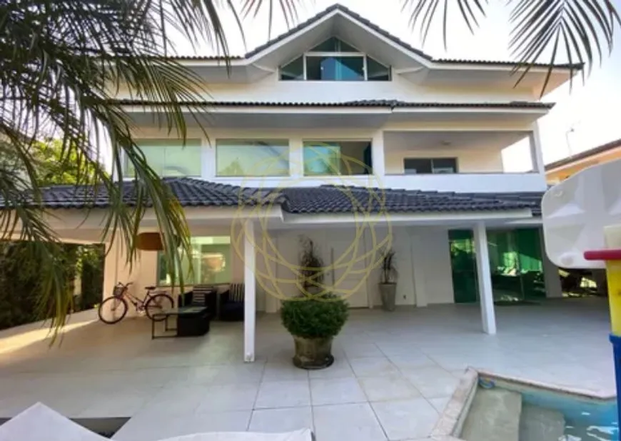 Foto 1 de Casa de Condomínio com 4 Quartos à venda, 600m² em Barra da Tijuca, Rio de Janeiro