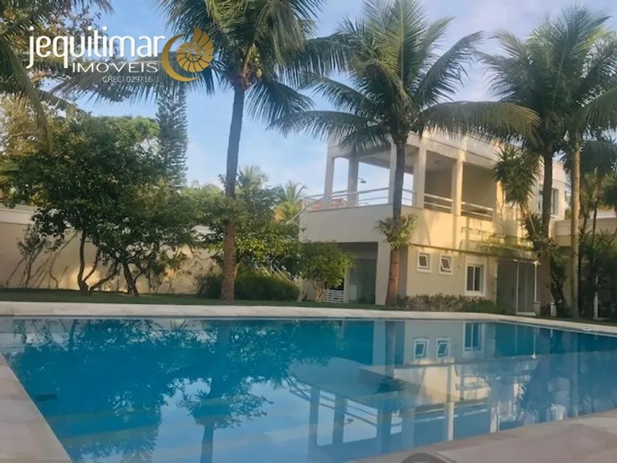 Foto 1 de Casa com 7 Quartos para venda ou aluguel, 581m² em Balneário Praia do Pernambuco, Guarujá