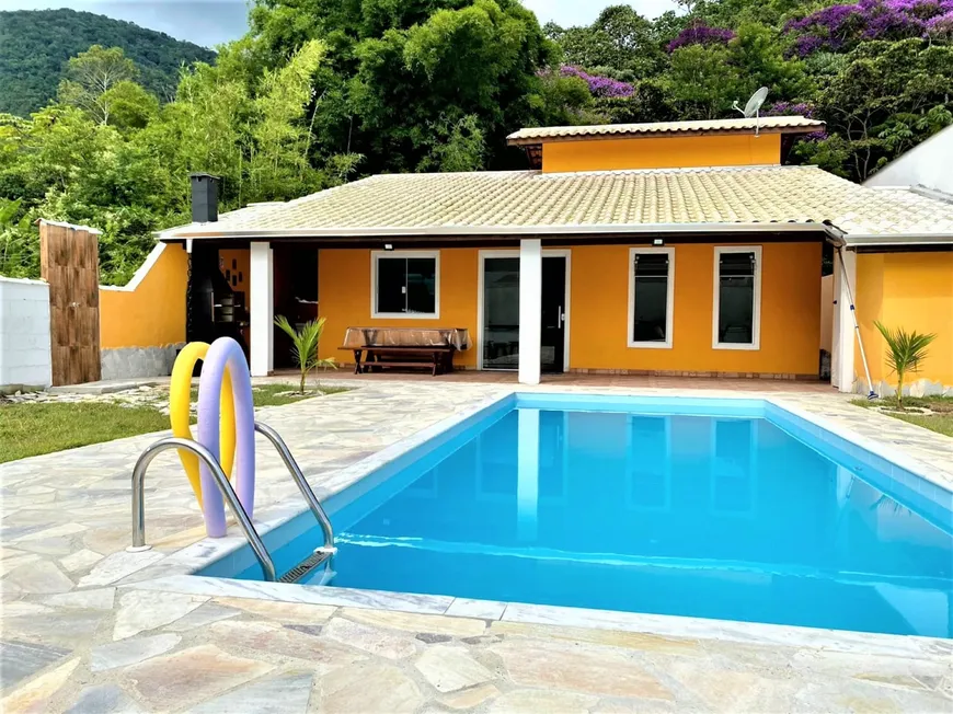 Foto 1 de Casa de Condomínio com 4 Quartos à venda, 160m² em Mar Verde, Caraguatatuba