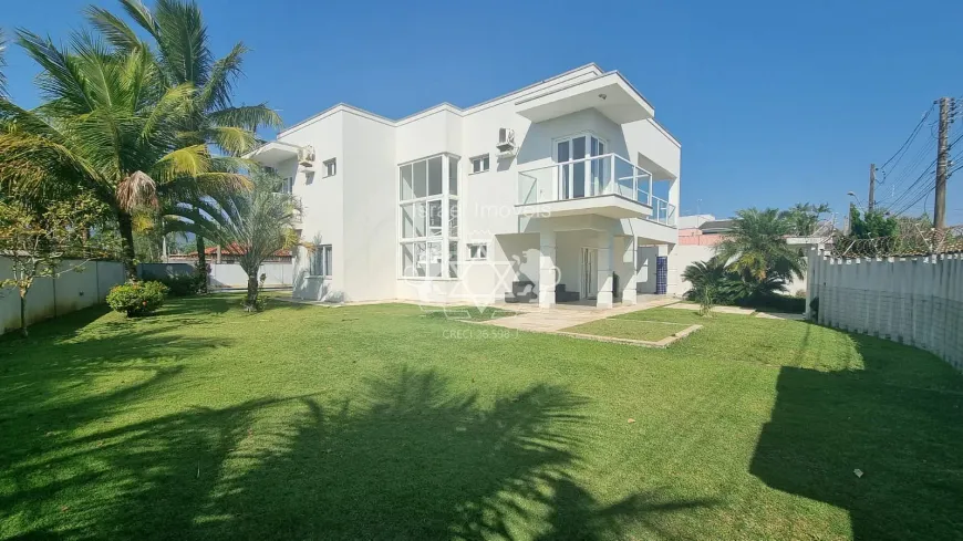 Foto 1 de Sobrado com 4 Quartos para venda ou aluguel, 450m² em Praia Das Palmeiras, Caraguatatuba