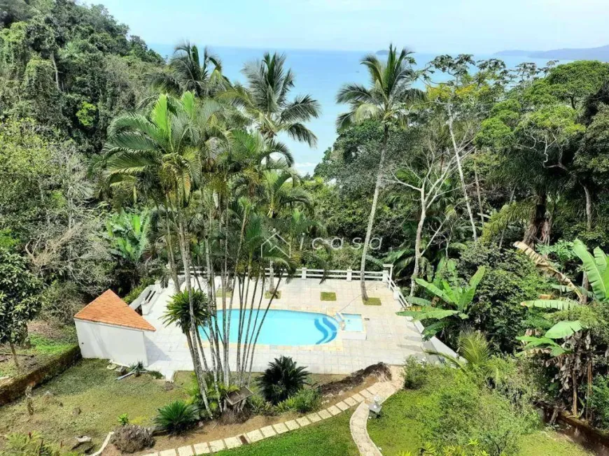 Foto 1 de Casa de Condomínio com 5 Quartos para venda ou aluguel, 450m² em Praia das Toninhas, Ubatuba