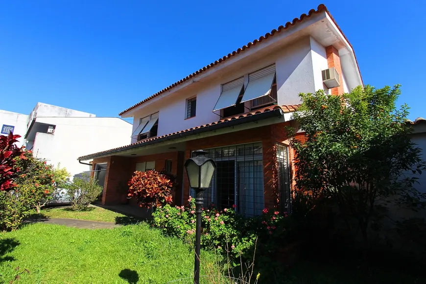 Foto 1 de Casa com 5 Quartos à venda, 320m² em Menino Deus, Porto Alegre
