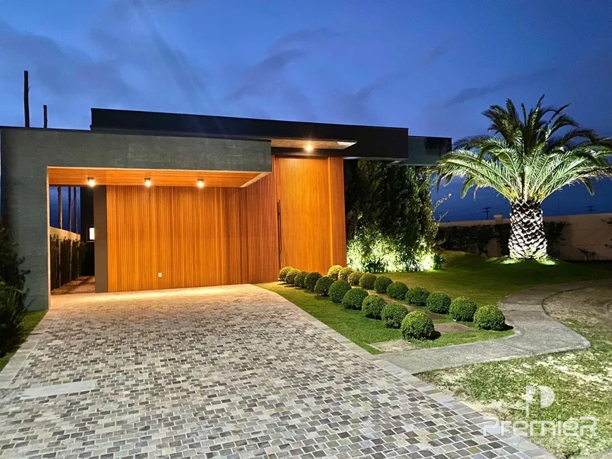 Foto 1 de Casa de Condomínio com 4 Quartos à venda, 285m² em Zona Nova, Capão da Canoa