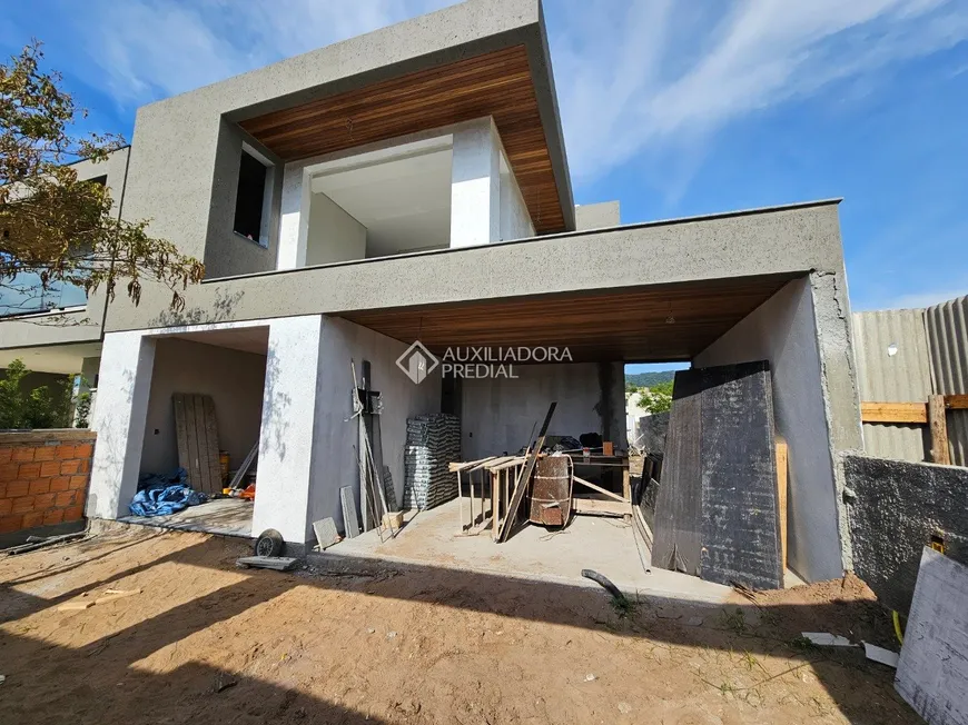 Foto 1 de Casa de Condomínio com 3 Quartos à venda, 250m² em Lagoa da Conceição, Florianópolis