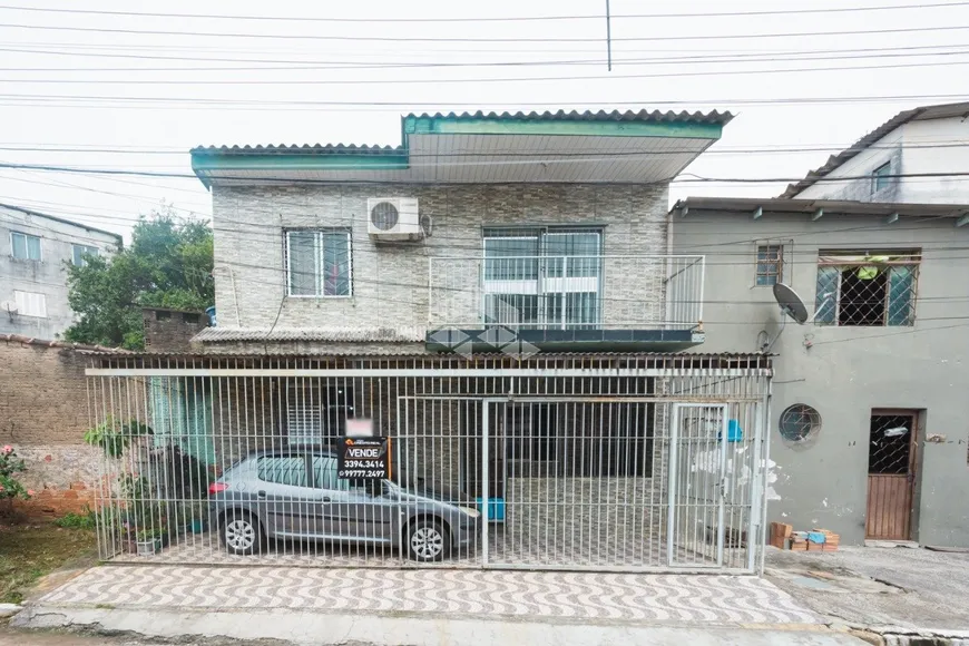 Foto 1 de Casa com 2 Quartos à venda, 130m² em Guajuviras, Canoas