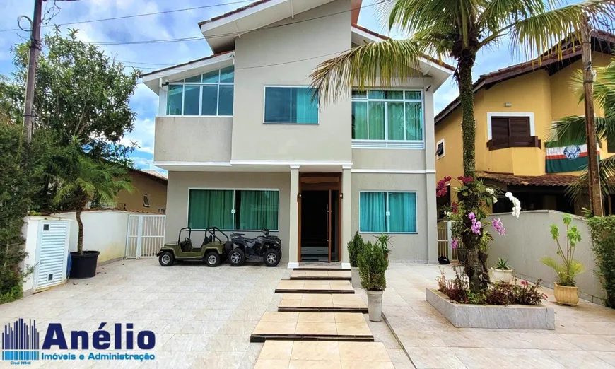 Foto 1 de Casa de Condomínio com 6 Quartos para venda ou aluguel, 210m² em Balneário Praia do Pernambuco, Guarujá