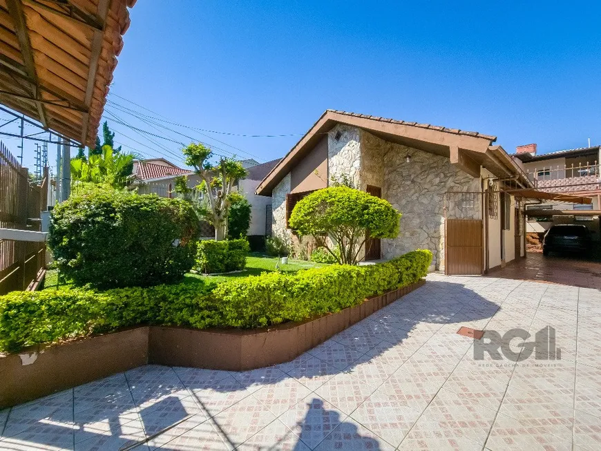 Foto 1 de Casa com 4 Quartos à venda, 131m² em Cavalhada, Porto Alegre