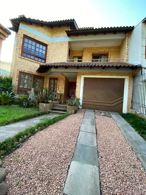 Foto 1 de Casa com 3 Quartos à venda, 205m² em Vila Ipiranga, Porto Alegre