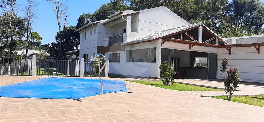 Foto 1 de Casa de Condomínio com 4 Quartos à venda, 450m² em Serra da Cantareira, Mairiporã