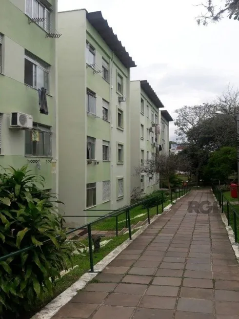 Foto 1 de Apartamento com 2 Quartos à venda, 64m² em Vila Nova, Porto Alegre
