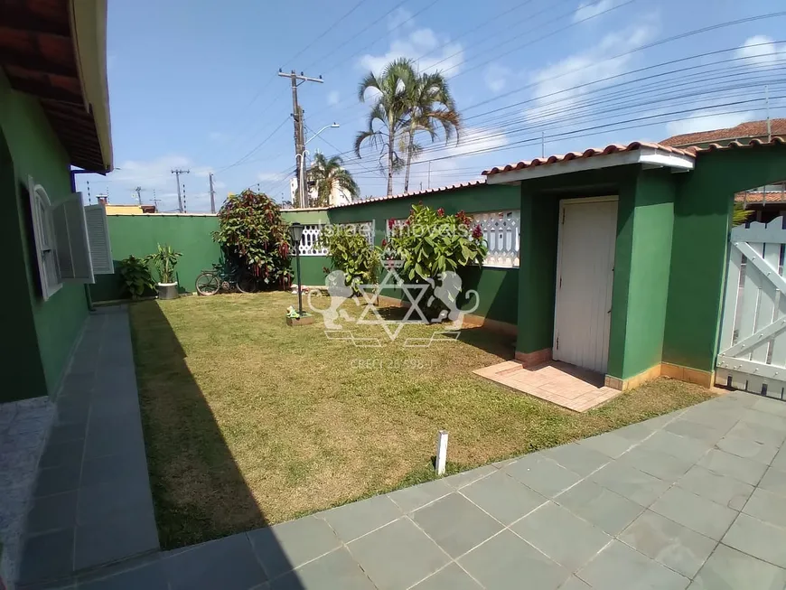 Foto 1 de Casa de Condomínio com 4 Quartos à venda, 185m² em Jardim Aruã, Caraguatatuba