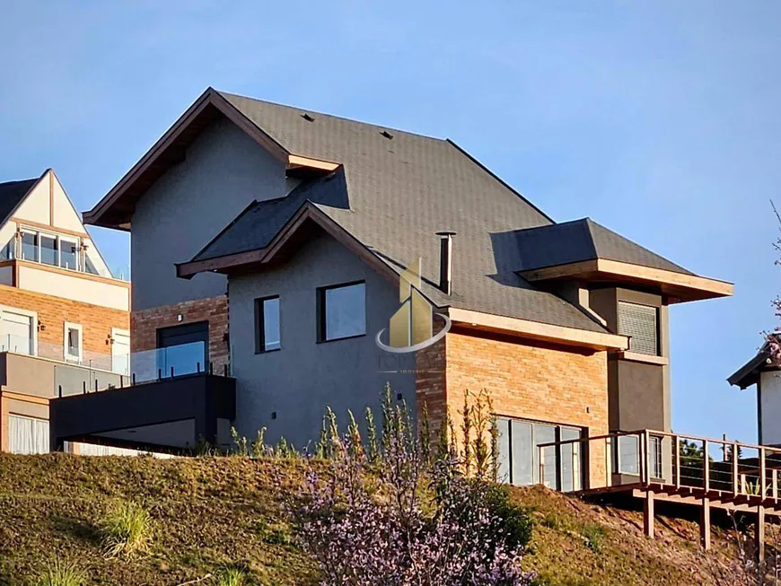 Foto 1 de Casa de Condomínio com 4 Quartos à venda, 300m² em Recanto das Araucarias, Campos do Jordão