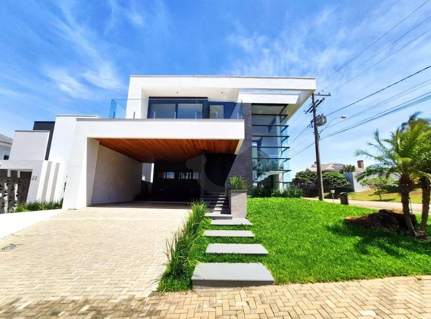 Foto 1 de Casa de Condomínio com 3 Quartos à venda, 228m² em Country, Santa Cruz do Sul