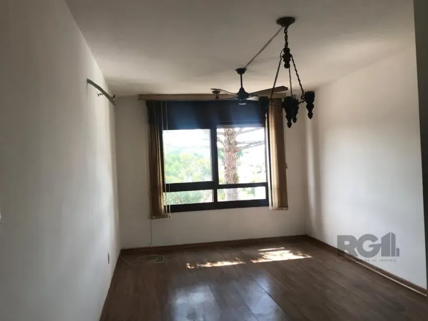 Foto 1 de Apartamento com 2 Quartos à venda, 75m² em Santo Antônio, Porto Alegre