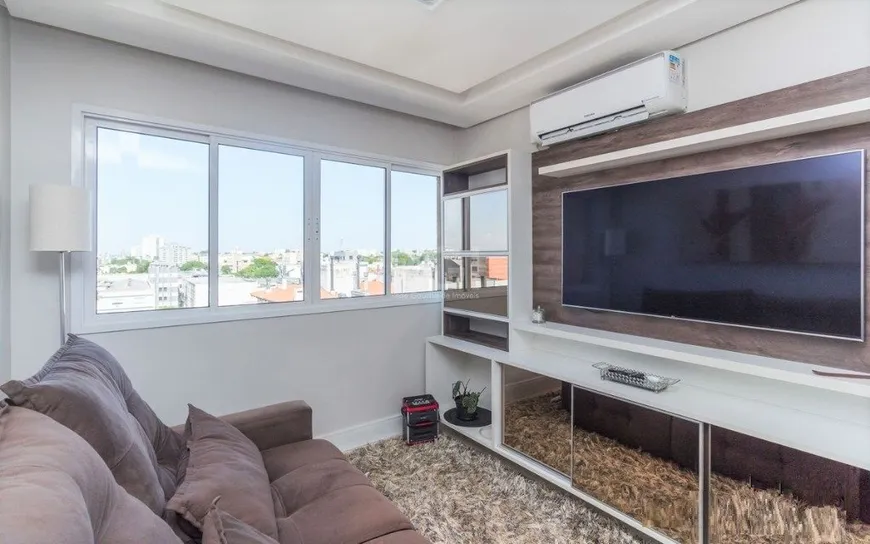 Foto 1 de Apartamento com 2 Quartos à venda, 55m² em Passo da Areia, Porto Alegre