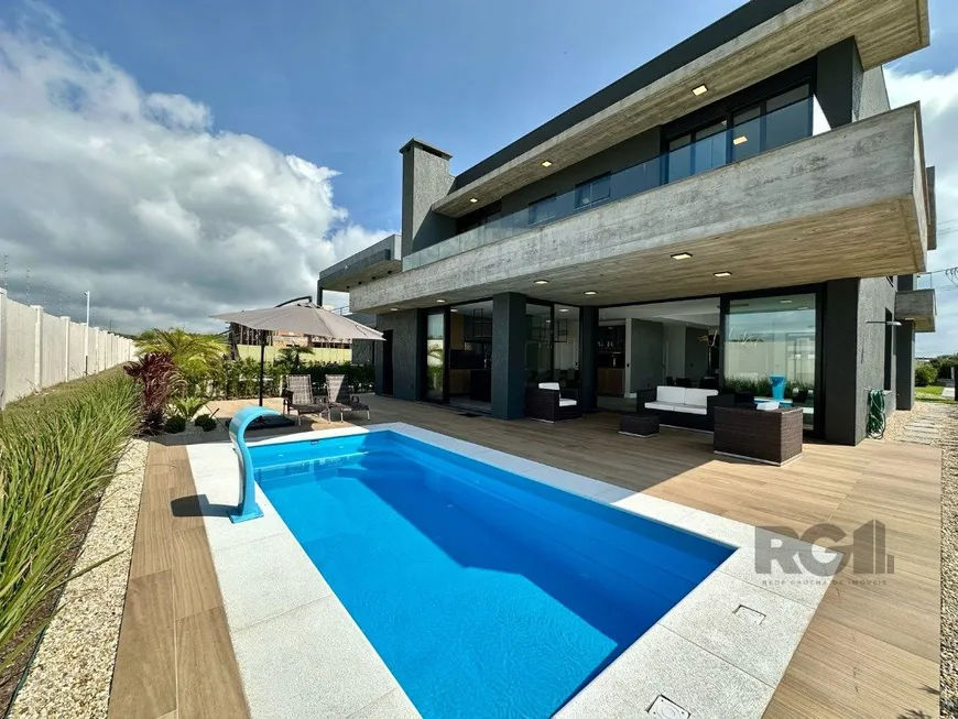Foto 1 de Casa de Condomínio com 5 Quartos à venda, 349m² em Capao Novo, Capão da Canoa