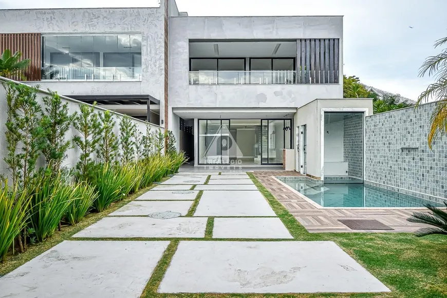 Foto 1 de Casa de Condomínio com 4 Quartos à venda, 360m² em Barra da Tijuca, Rio de Janeiro