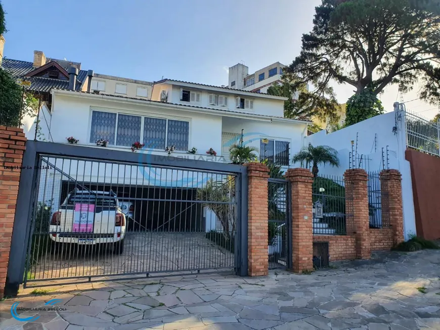 Foto 1 de Casa com 5 Quartos para venda ou aluguel, 440m² em Três Figueiras, Porto Alegre