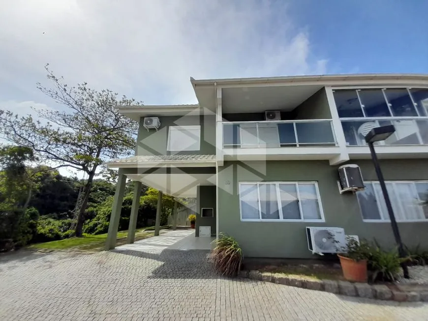 Foto 1 de Casa de Condomínio com 3 Quartos para alugar, 140m² em Barra da Lagoa, Florianópolis