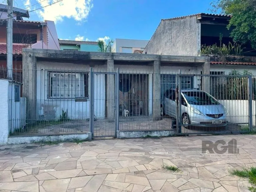 Foto 1 de Casa com 2 Quartos à venda, 94m² em Jardim Botânico, Porto Alegre